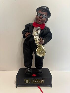 The Jazzman Saxophone Figure with Red Bow Tie